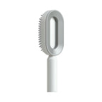 Brosse démêlante autonettoyante NOVIA · 1 brosse / Blanc